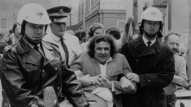Jack Mundey is carried away from a protest in October, 1973. 