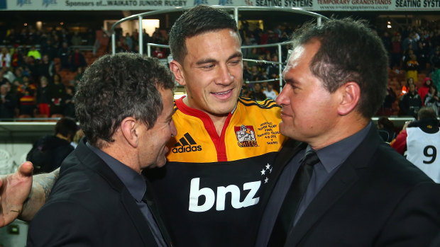 Wayne Smith (left), Sonny Bill Williams (centre) and Dave Rennie (right) celebrate after the Chiefs won the Super Rugby title in 2012.