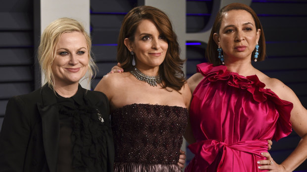 Amy Poehler, from left, Tina Fey and Maya Rudolph at the Vanity Fair Oscar Party.