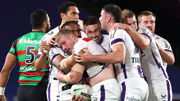 Josh King celebrates his try for Melbourne.