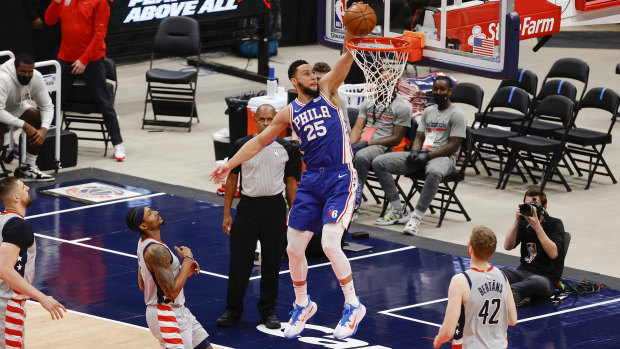 The Philadelphia 76ers’ Ben Simmons soars for a dunk in game four of the first round playoff series against the Wizards.