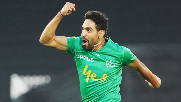Triple treat: Haris Rauf celebrates after claiming a hatrick for the Melbourne Stars at the MCG.