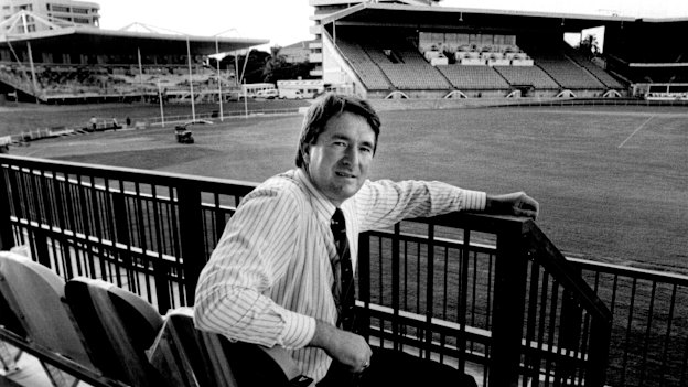 Then-Brisbane Bears CEO Andrew Ireland, with the old western stand to the left, pictured at the Gabba in 1993.