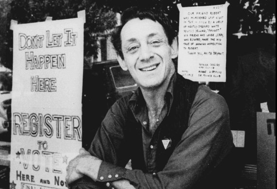 Harvey Milk, photographed in front of his camera shop in San Francisco in 1977.