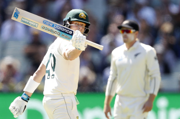 Steve Smith celebrates after hitting a half-century at the MCG on Boxing Day.