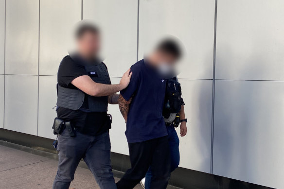 AFP officers arresting Jarin Towney in connection to the shipment.