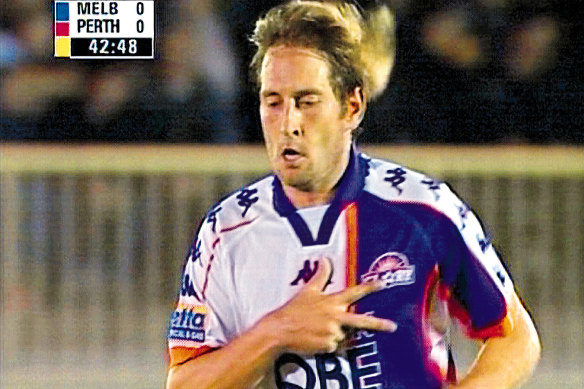 Perth Glory’s Bobby Despotovski makes a Serbian nationalist salute during a game against Melbourne Knights in 2001.