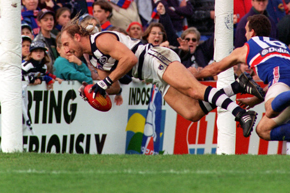 Gary Ablett playing for Geelong during the heyday of his colourful career.