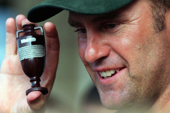 Australia’s cricket captain Mark Taylor holds the Ashes after Australia won the series 3-2.