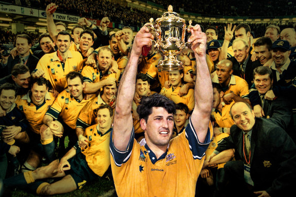 Glory days: John Eales, then the Wallabies captain, raises the William Webb Ellis Trophy after winning the 1999 World Cup.