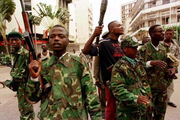 Zairean civil guardsmen patrolling the streets of what is now the Democratic Republic of the Congo.