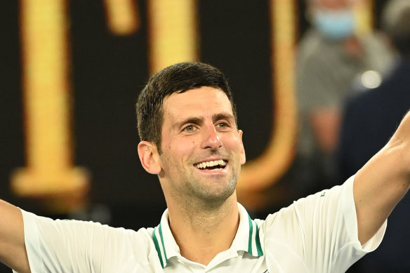 Novak Djokovic celebrates his ninth Australian Open title. 