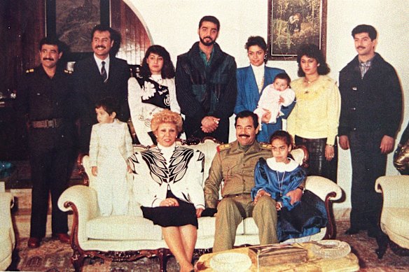 Saddam Hussein (seated, centre) with his family in 1990. Saddam was eventually toppled by a US-led invasion in 2003, and executed three years later.