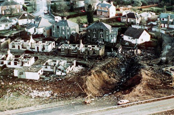 Wrecked houses and a deep gash in the ground in Lockerbie after a bomb brought Pan Am 103 down.