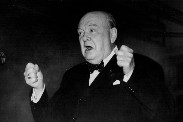 “With clenched fists, Winston Churchill drives home a point during his speech at St. Barnabas Secondary School, Woodford Green.“October 9, 1951.
