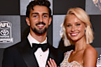 MELBOURNE, AUSTRALIA - SEPTEMBER 23: Josh Daicos of the Collingwood Magpies and partner Annalise Dalins arrive ahead of the 2024 Brownlow Medal at Crown Palladium on September 23, 2024 in Melbourne, Australia. (Photo by Quinn Rooney/Getty Images)