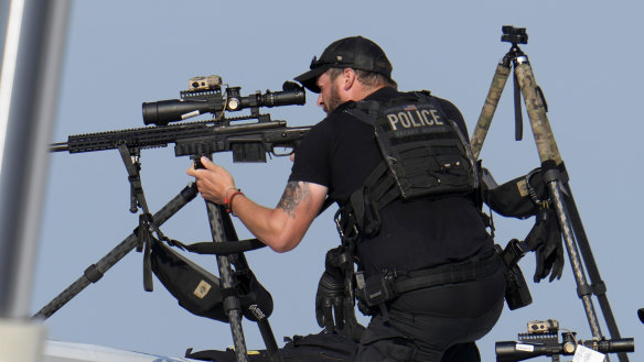 Police snipers return fire after shots were fired while Republican presidential candidate former President Donald Trump was speaking at a campaign event in Butler, Pennsylvania.