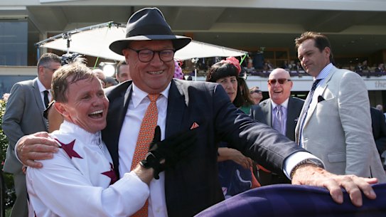 Jockey Barend Vorster and trainer Tony McEvoy enjoy Sunlight's triumph.