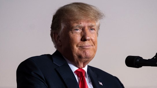 Officials told former president Donald Trump, pictured, that they would resign if he put Jeffrey Clark in charge at the Justice Department.