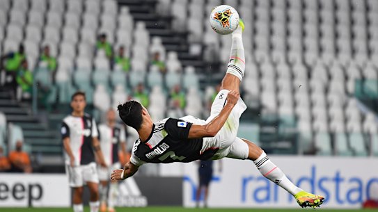 It wasn't this spectacular effort but Cristiano Ronaldo scored his 728th goal the day his great rival crossed the 700 threshold.