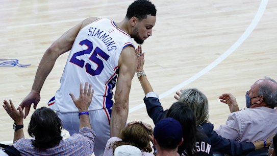 Ben Simmons bumps into fans seated courtside during the fourth quarter of game seven of the eastern conference semi-finals against the young Atlanta Hawks.