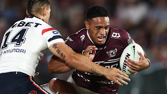 Viliami Fifita is at the centre of a tug of war.