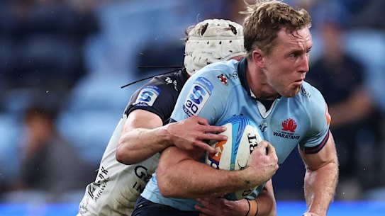 SYDNEY, AUSTRALIA - MAY 22: Harry Potter of the Waratahs is tackled during the round 11 Super Rugby match between NSW Waratahs and ACT Brumbies at Allianz Stadium, on May 22, 2026, in Sydney, Australia. (Photo by Cameron Spencer/Getty Images)