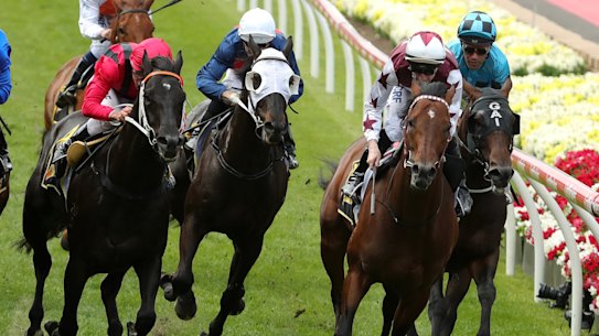 John Allen rides Cliff's Edge to victory in the Crystal Mile.