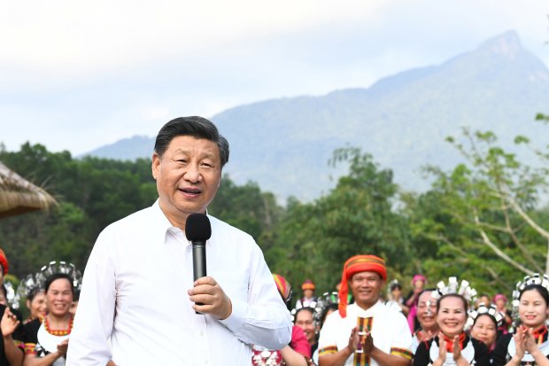 Xi visits villagers in Hainan province in April to inspect projects tackling poverty and rural rejuvenation.  