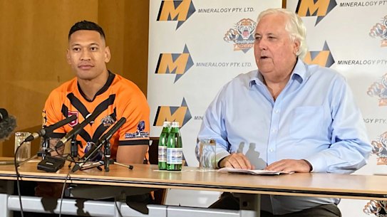 Israel Folau and Clive Palmer at their press conference at the Hilton Hotel in Brisbane on Friday.