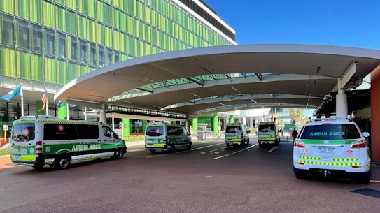 Ambulances wait outside of the emergency department at Sir Charles Gairdner Hospital. 