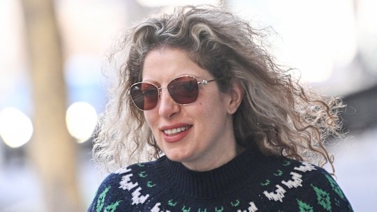 HWU secretary Diana Asmar before entering a staff meeting on Friday. 