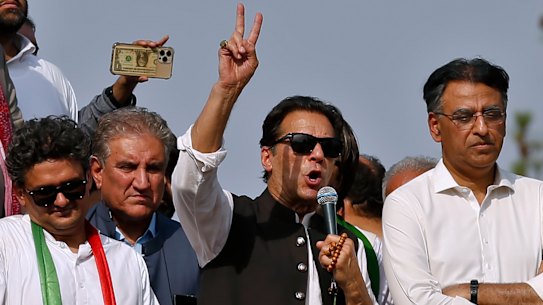 Pakistan’s defiant former prime minister Imran Khan, centre, addresses an anti-government rallyin Islamabad.