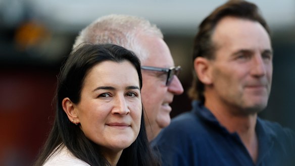 Laura Kane, will take over as AFLW executive while retaining an operations role in the men’s game. Pictured here with CEO Andrew Dillon and AFL football performance executive Greg Swann.