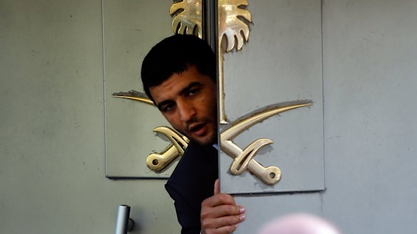 Officials leave the Saudi Arabia consulate in Istanbul on Sunday.