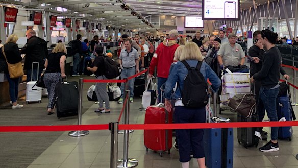 Sydney Airport is experiencing significant delays and cancellations to flights as winds and rain take hold of the city.