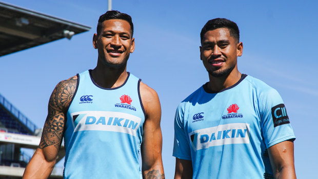 Big brothers: Israel and John Folau pose for a photo before the Waratahs' match against the Sunwolves in round seven. 