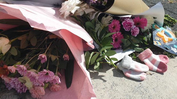 Tributes left for the couple killed at Alexandra Hills.