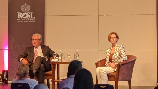 Former Foreign Minister Alexander Downer and former Prime Minister Julia Gillard in London.