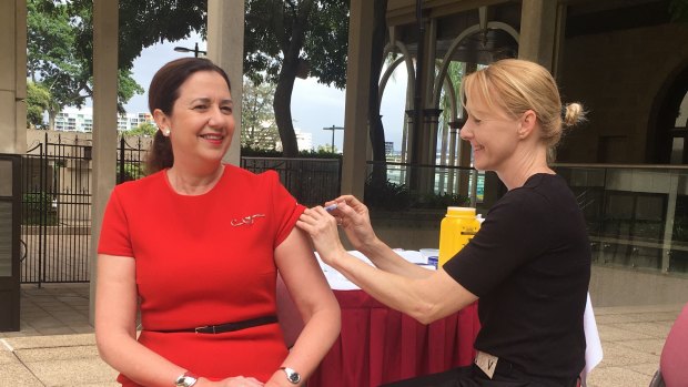 Queensland Premier Annastacia Palaszczuk gets a flu shot on Tuesday.