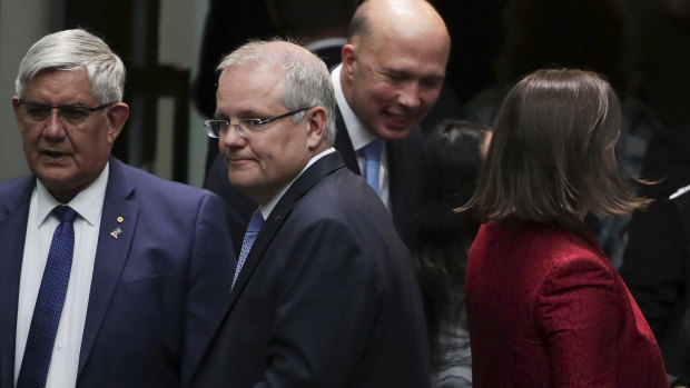 Prime Minister Scott Morrison, with ministers Ken Wyatt, Peter Dutton and Kelly O'Dwyer on  Monday.