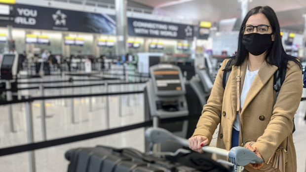 Prue O'Donnell checks in for repatriation flight QF110 at London's Heathrow Airport.