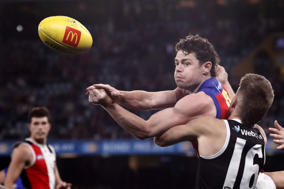 Lachie Neale gets a handball away against St Kilda.