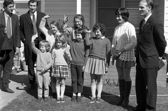 Victorian education minister Lindsay Thompson with Mary Gibbs and her six pupils after their rescue from kidnappers.  