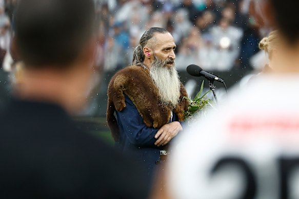 Uncle Colin Hunter delivers the Welcome to Country before the Anzac Day clash between Collingwood and Essendon at the MCG.