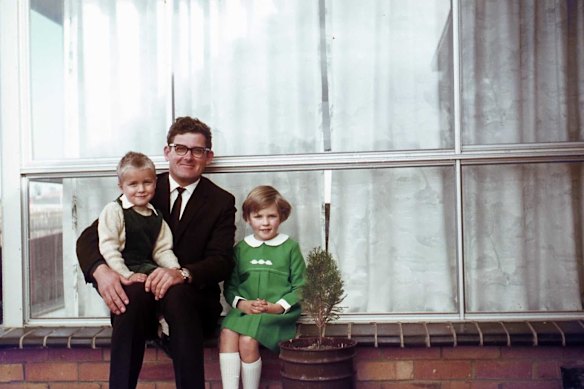 Raymond Gray with his eldest children, Geoff and Deb, at their home years ago.