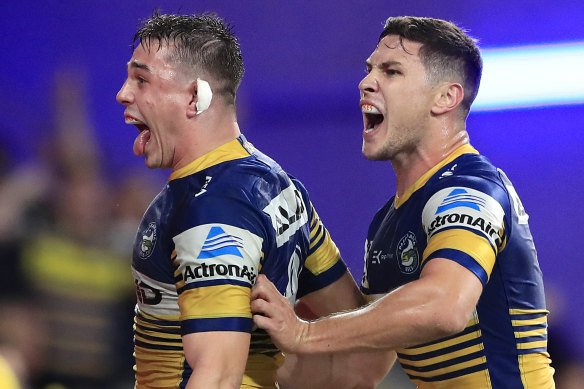 Reed Mahoney of the Eels (right) after scoring a try at Bankwest Stadium.