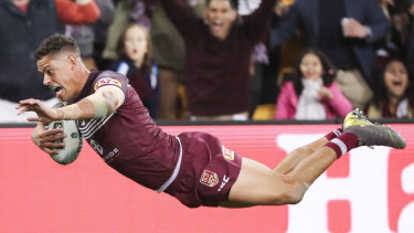 Dane wreck: Dane Gagai launches himself through the air after running 100 metres to score.