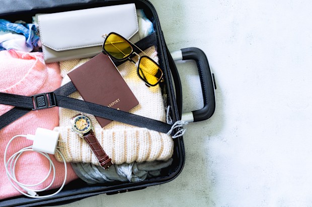 Luggage and travel,costume Travel equipment. Passport, suitcase, sunglasses, travel map fee prepared for the trip,phone charger