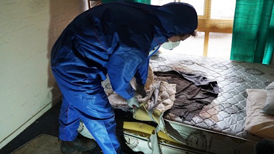 Melbourne Forensic Cleaners Josh Marsden removes the bio hazard material.  
